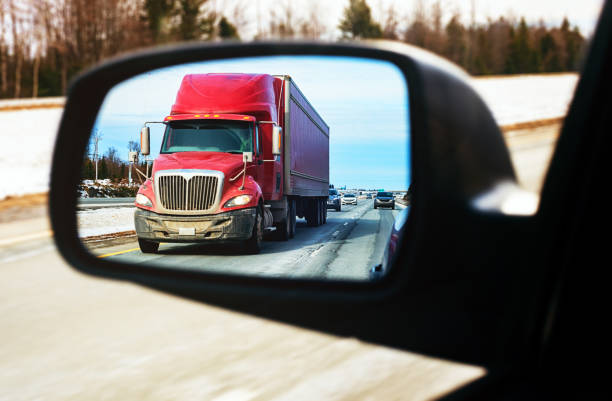 istock Semi Truck in Mirror 1132846437