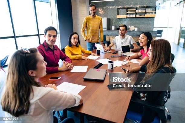 Start Up Meeting In Coworking Office Stock Photo - Download Image Now - Adult, Adults Only, Board Room