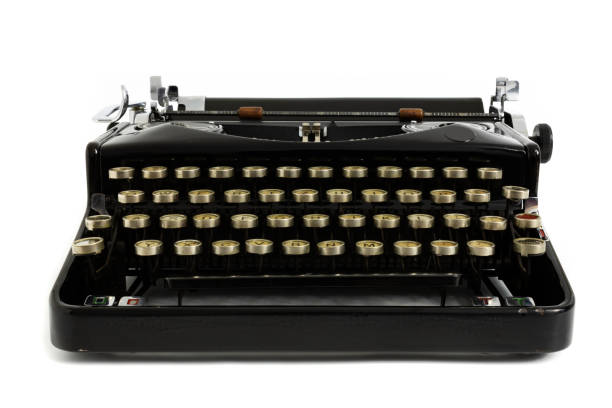 istock Old retro vintage typewriter in black color isolated on white background 1132849803