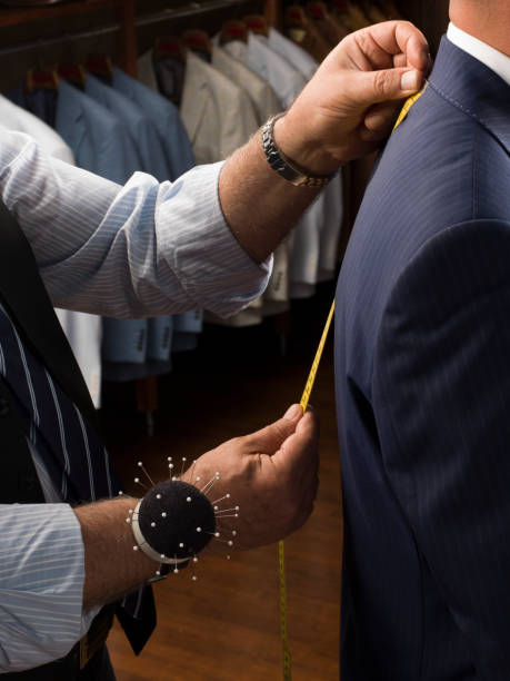istock Man Measuring Jacket on Male Dress 1132860888
