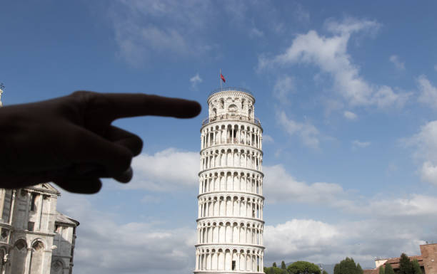 istock Finger pushing the leaning tower of Pisa 1132861276