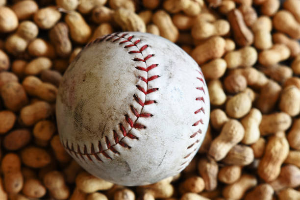 vieux cuir de baseball - baseball baseballs peanut american culture photos et images de collection