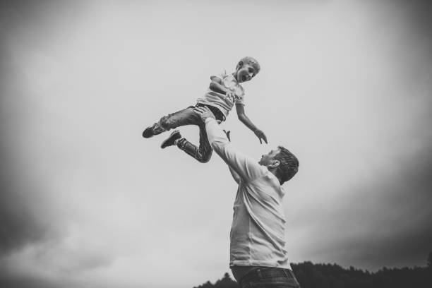 istock Father and  son,enjoying in nature 1132863887