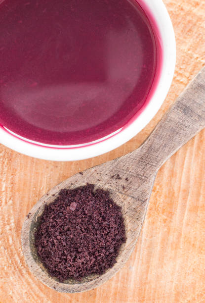 istock Berries and juice of acai - Euterpe oleracea 1132869543