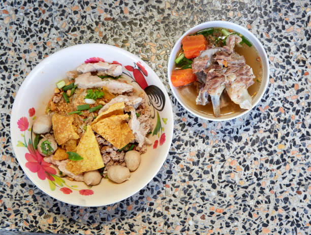 istock Wide rice noodles with vegetables, pork Thai style 1132872986