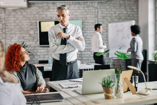 istock Business people working together in modern office. 1132873313