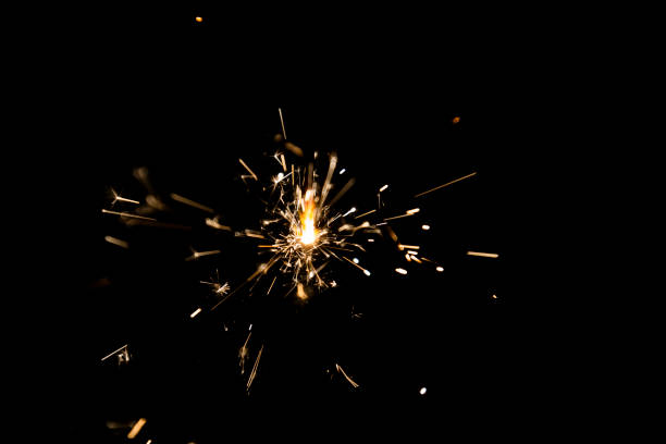 istock Burning sparkle in pitch black surrounding 1132874300