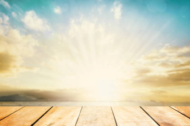 istock Perspective border wood table beach outside on calm blue sky in spring background concept for wide dinning board on summer landscape wallpaper bacground, mockup promotion product. 1132874369