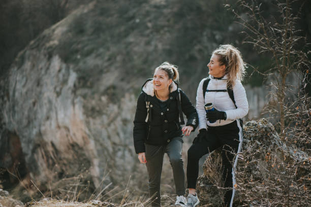 istock Friends on the mountain peak 1132881017