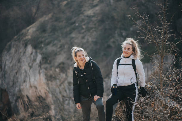 istock Friends on the mountain peak 1132881026