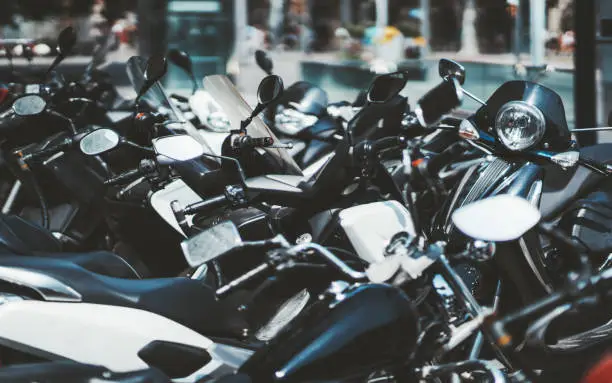 Photo of Plenty of motorcycles parked outdoors