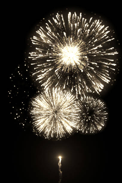 istock Golden fireworks with trail isolated on the black background 1132884669