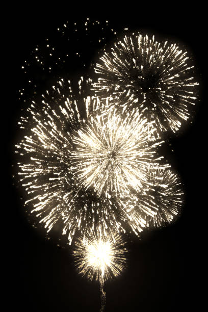 istock Golden fireworks with trail isolated on the black background 1132884680