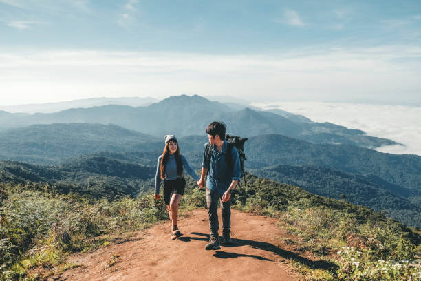 istock Hikers Couple on the mountain Adventure Time 1132884843