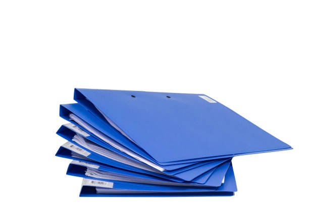 istock file folder and Stack of business report paper 1132885656
