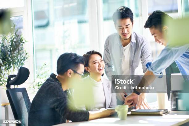 Asian Corporate Executive Meeting In Office Stock Photo - Download Image Now - Asian and Indian Ethnicities, Asia, East Asian Culture