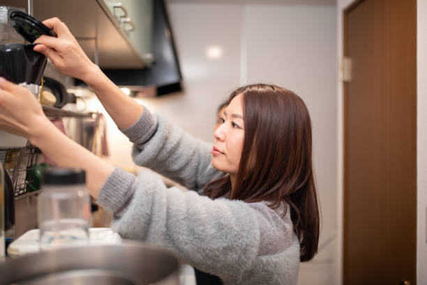 istock Woman cooking in kitchen 1132892419