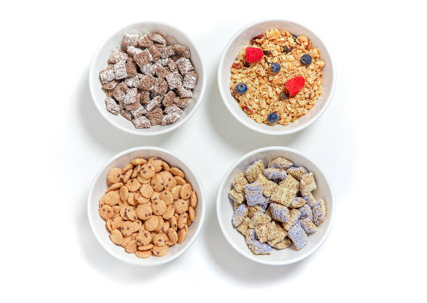 istock bowls of different breakfast cereals with berries. 1132894426