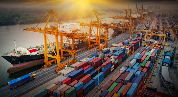 istock Logistics and transportation of Container Cargo ship and Cargo plane with working crane bridge in shipyard, logistic import export and transport industry background 1132895039