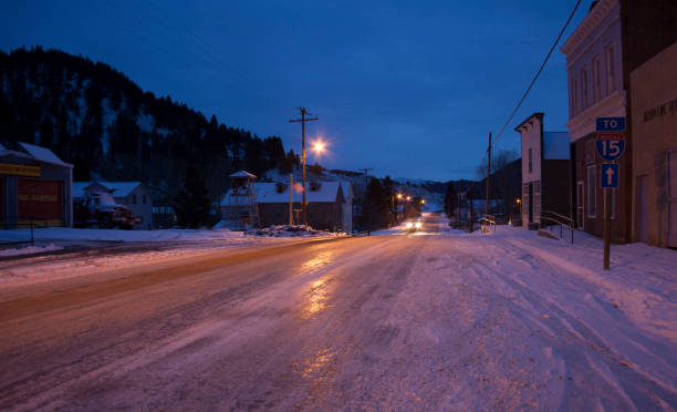 istock Small Wintery Mountain Town at Night 1132898077