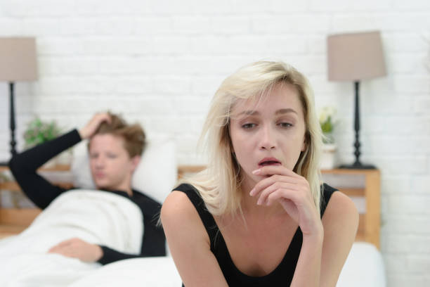 istock Frustrated sad girlfriend sit on bed think of relationship problems,upset lovers consider break up, offended person disappointed by boyfriend. 1132899027