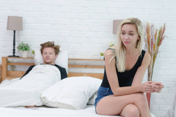 istock Frustrated sad girlfriend sit on bed think of relationship problems,upset lovers consider break up, offended person disappointed by boyfriend. 1132900132