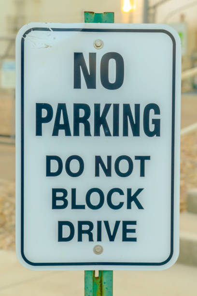 istock No Parking Do Not Block Drive road sign 1132906854