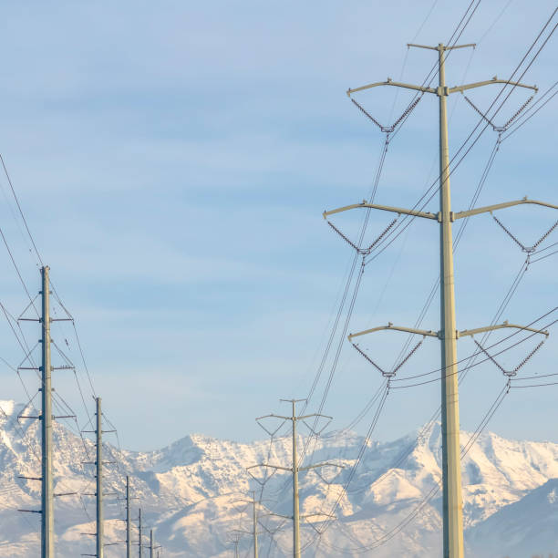 istock Power lines against snow capped Mount Timpanogos 1132906873