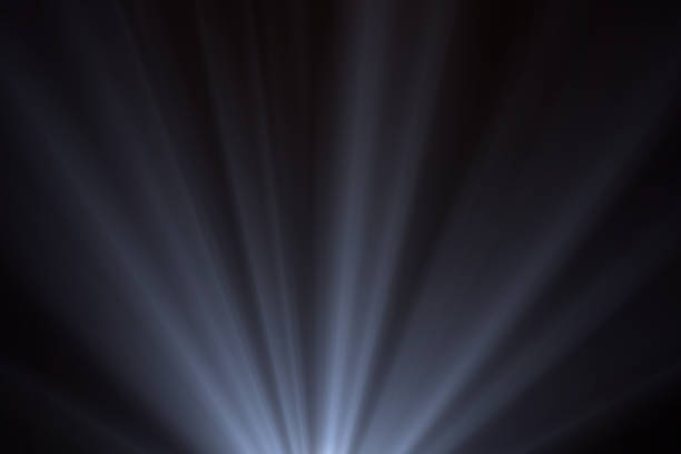Rays of light isolated on the black background for overlay design ( screen blending mode layers )