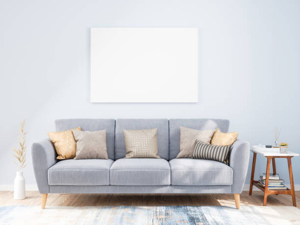 Mockup Frame on Living Rooms Wall with Sofa Mockup Frame on Living Rooms Wall with Sofa artists canvas photos stock pictures, royalty-free photos & images