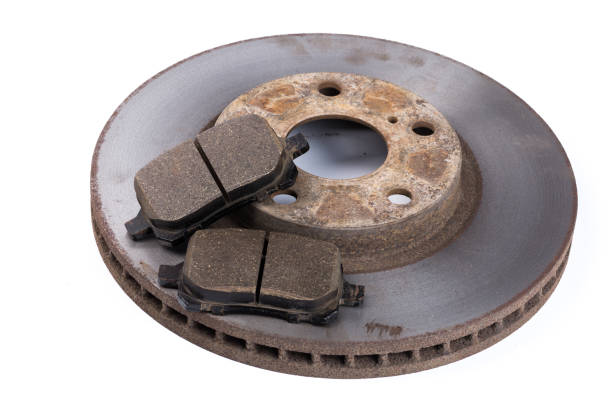istock Brake pads and brake discs on white background. Auto parts 1132908606