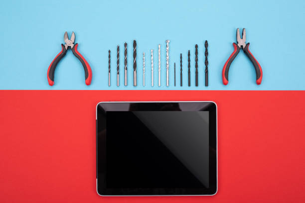 set of metalwork tools with tablet on colorful background different metalwork kits with black tablet on blue background make over series stock pictures, royalty-free photos & images