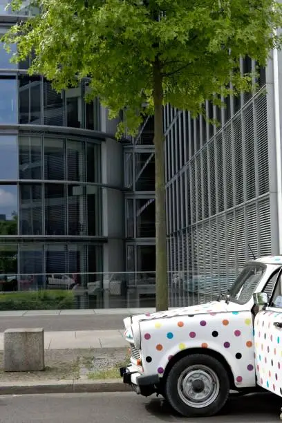 Trabant photographed in front of the modern offices of the German parliament.