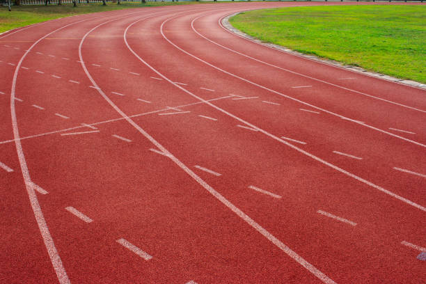 istock Red running track Synthetic rubber on the athletic stadium 1132917894