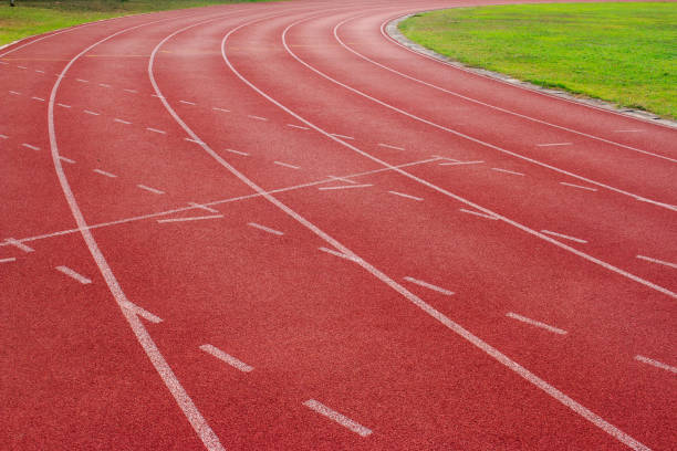 istock Red running track Synthetic rubber on the athletic stadium 1132918295