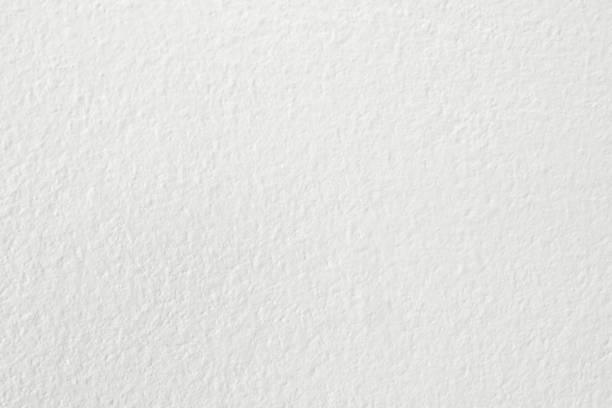 istock White grunge cement wall texture for background and design art work. 1132918864