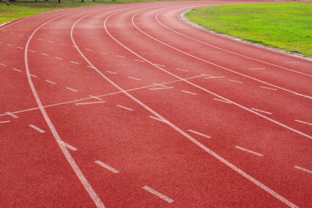 istock Red running track Synthetic rubber on the athletic stadium 1132919171