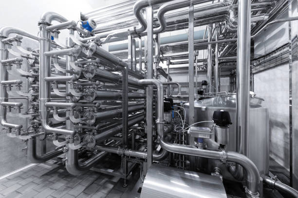 istock Industrial pipelines and modern equipment in cheese production interior 1132921167