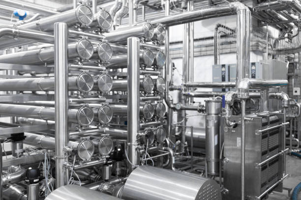 istock Industrial pipelines and modern equipment in cheese production interior 1132921169
