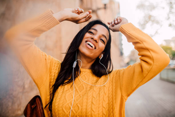 istock Girl dancing on the street 1132921265