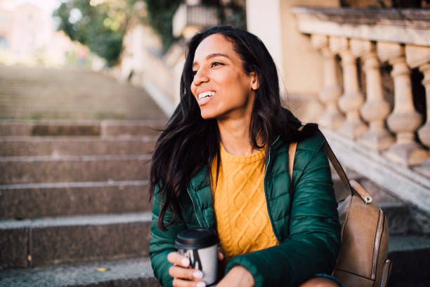 istock Girl drinking coffee to go 1132922223