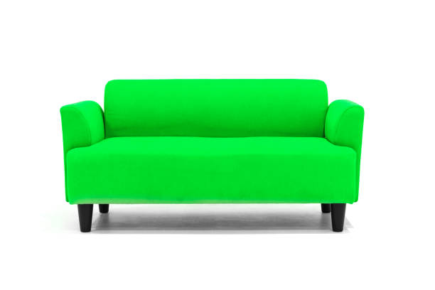 istock Green Scandinavian style contemporary sofa on white background with modern and minimal furniture design for stylish living room. 1132925807