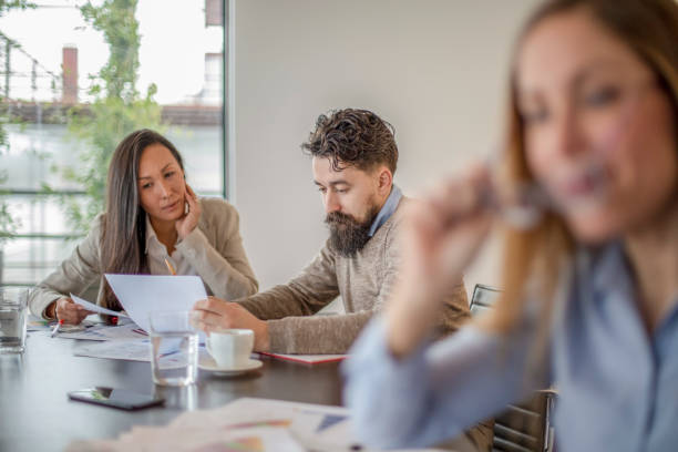 istock Multi-ethnic group of colleagues at meeting 1132926467