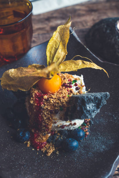 istock Icelandic ice cream menu with volcanic rock sugar cane and blueberries. 1132928572
