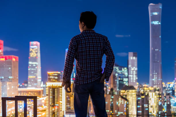 istock A man Standing in Front of Modern City 1132929478