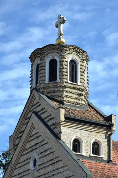 istock unusual brick decorated Orthodox Church against blue sky 1132933452