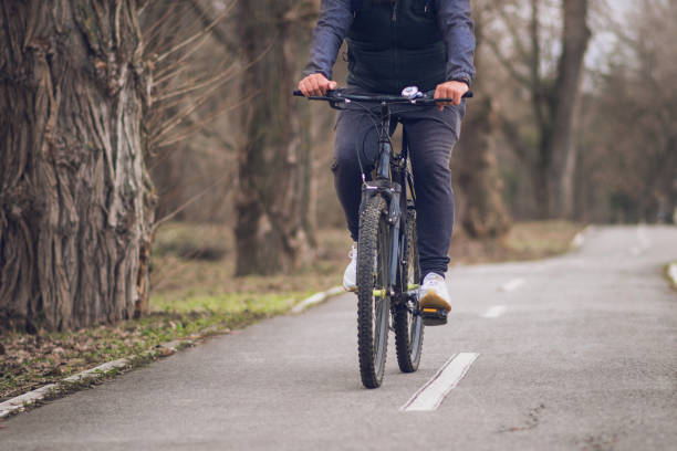istock Man riding his bicycle out in nature 1132934205