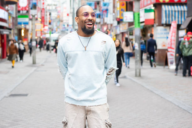 istock Cheerful man walking outside 1132939490