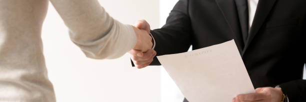 Horizontal closeup view businesspeople shaking hand starting job interview Close up hands of businesspeople greeting each other starting negotiations, hr manager handshaking with vacancy candidature, human resources concept. Horizontal photo banner for website header design narrow stock pictures, royalty-free photos & images
