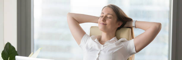 istock Horizontal image businesswoman sitting on chair resting put hands behind head 1132941099